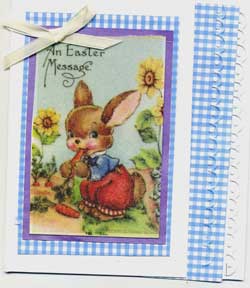 Easter card featuring vintage bunny collage art enhanced with glitter, embossing and ribbon